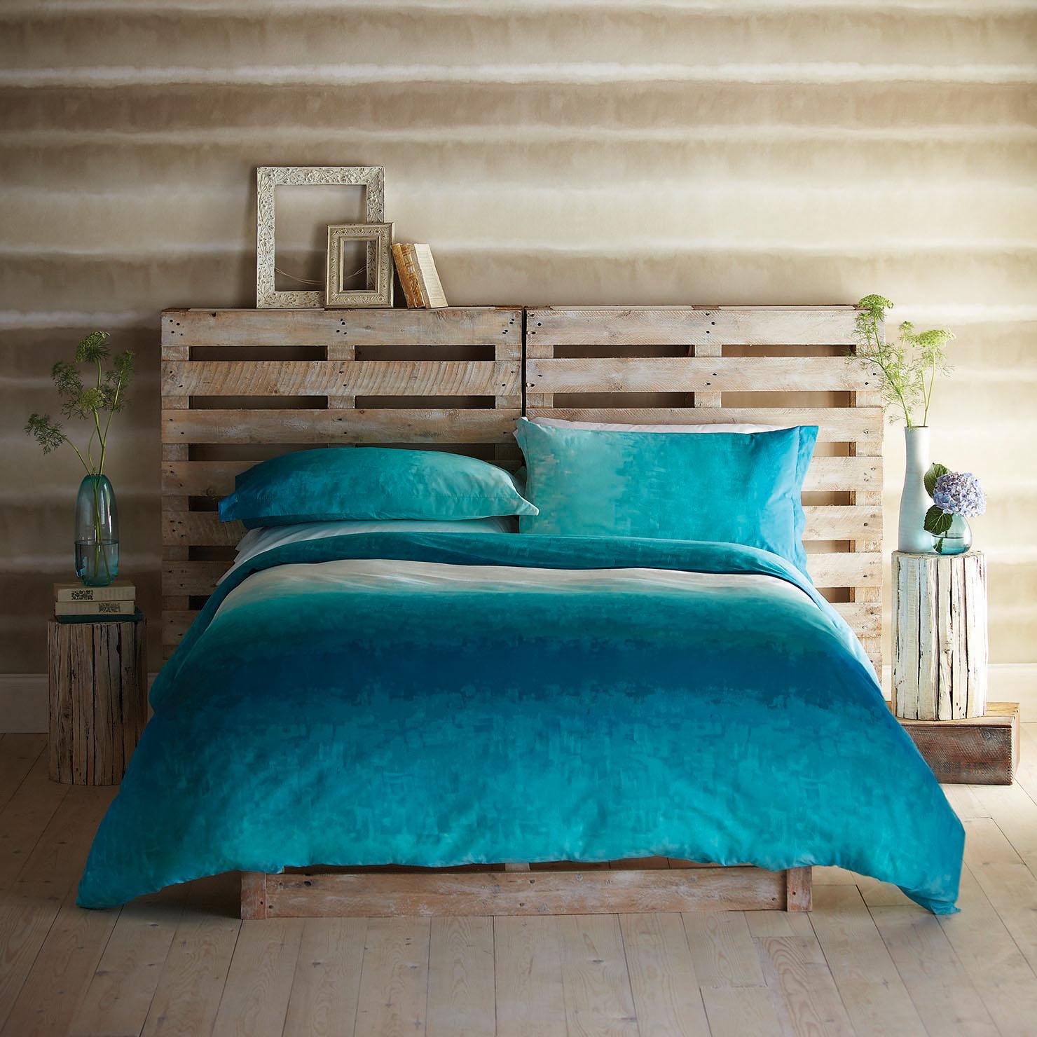 cama hecha con palets